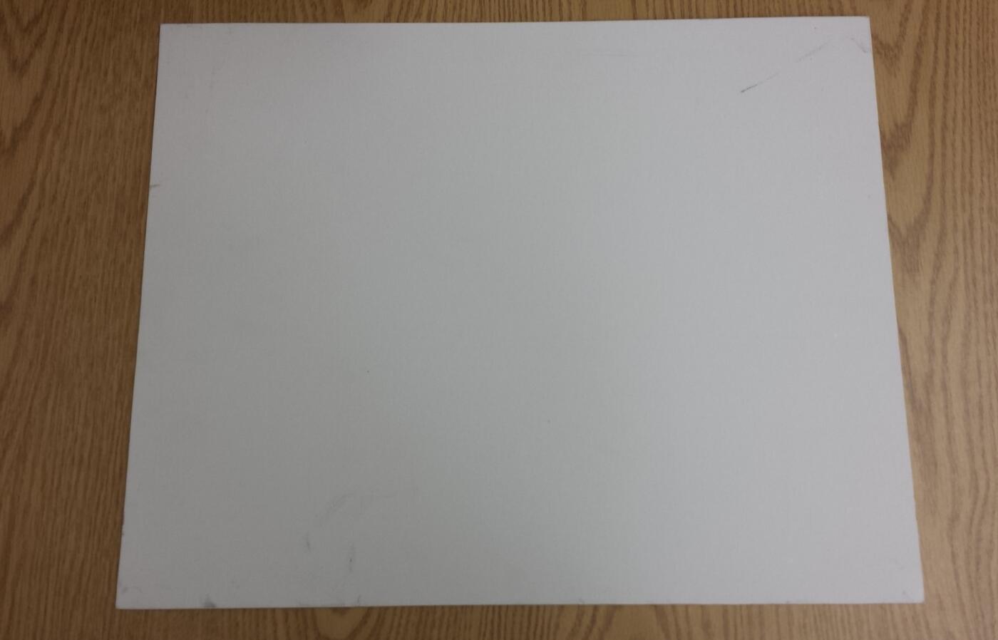 White Board on a wooden background
