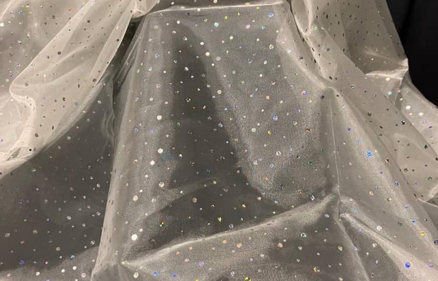 Shear white glitter drape