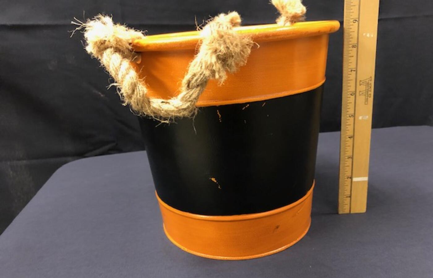 Orange and black bucket