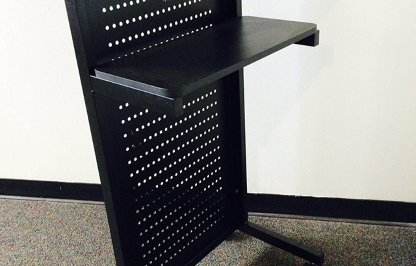 Black metal podium