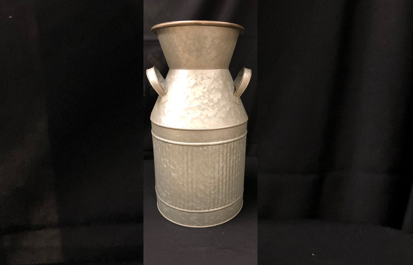 Silver metal milk jug